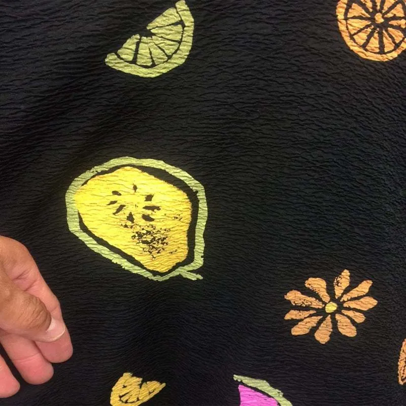 60 Inches Wide Poly Rayon Textured With Fruits Print On Black Background Rayon Challis